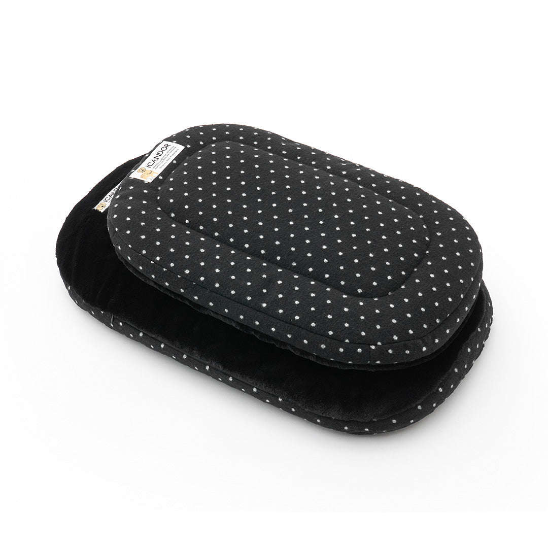 iCANDOR Urban Nest Cushion in Polka Dot: two cushions stacked, showing the polka-dot and black eco-fur sides