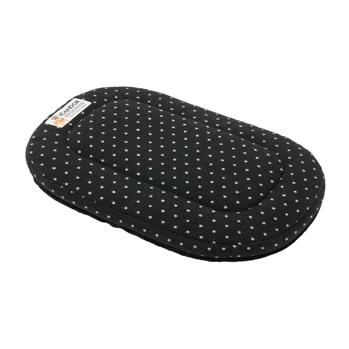 Urban Nest Cushion in Polka Dot: polka-dot side, three-quarter view
