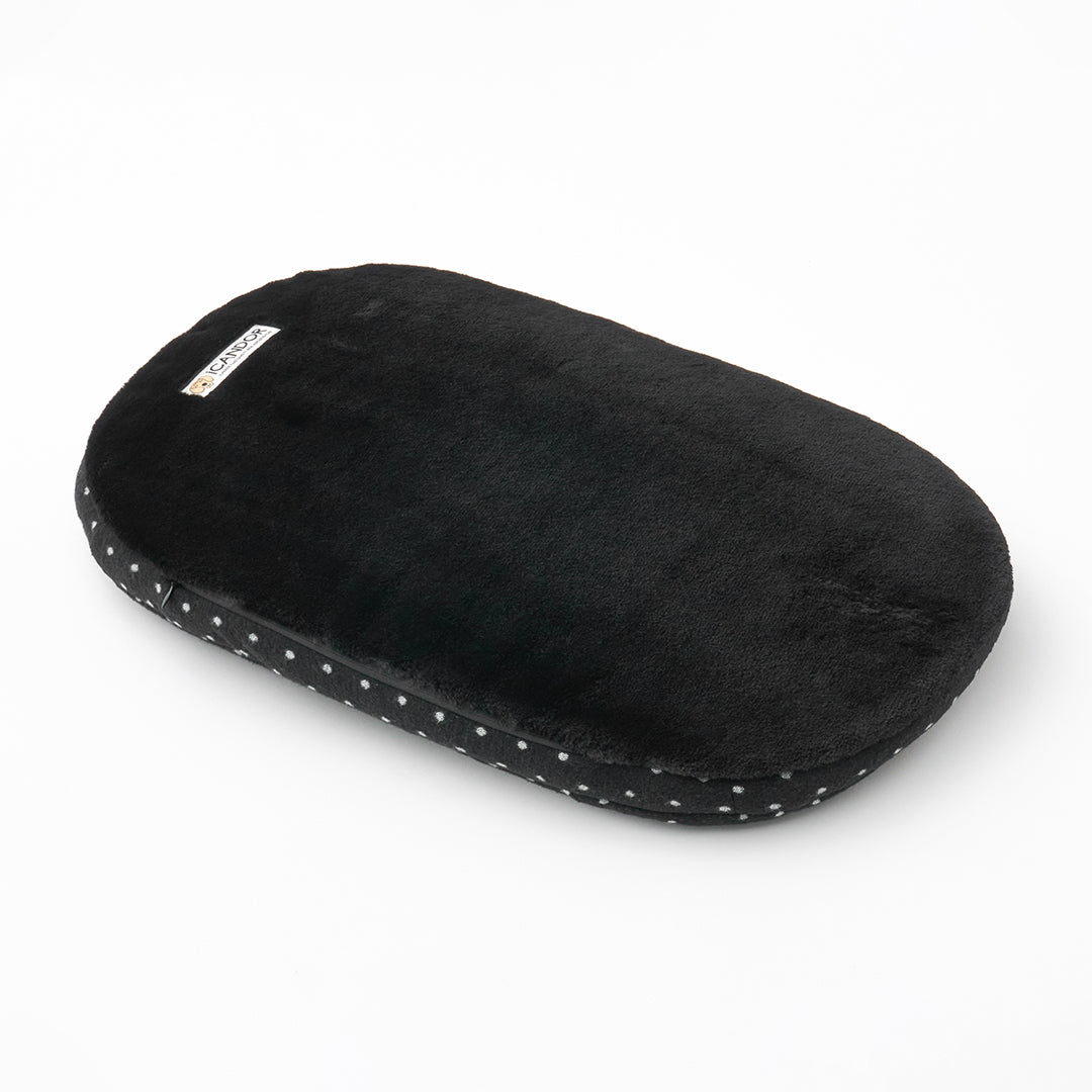 Urban Nest Cushion in Polka Dot: black eco-fur side, three-quarter view