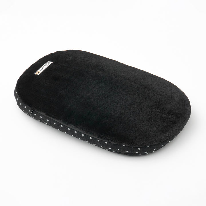 Urban Nest Cushion in Polka Dot: black eco-fur side, three-quarter view