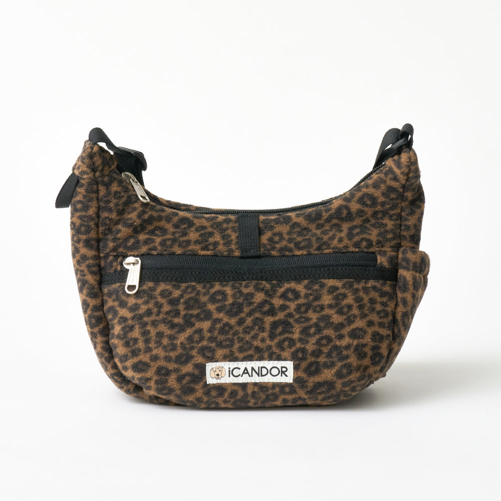 Crescent Bag in Leopard: front zip pocket, iCANDOR label and strap rings