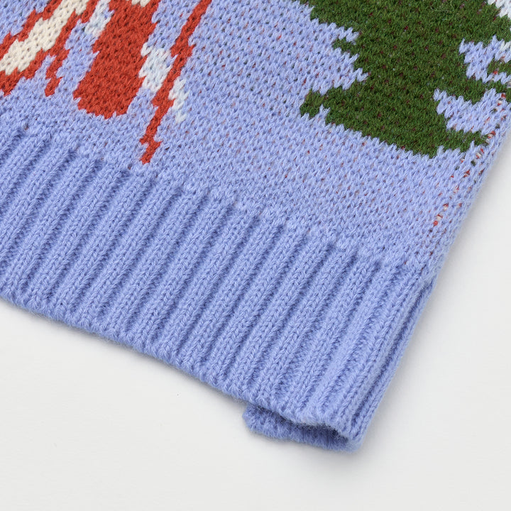 Aspen Woolies Apres knit texture close-up with tree and ski motif
