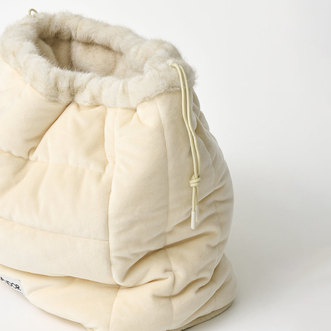 Snuggle Nest: quilted velboa shell and side drawstring, close-up